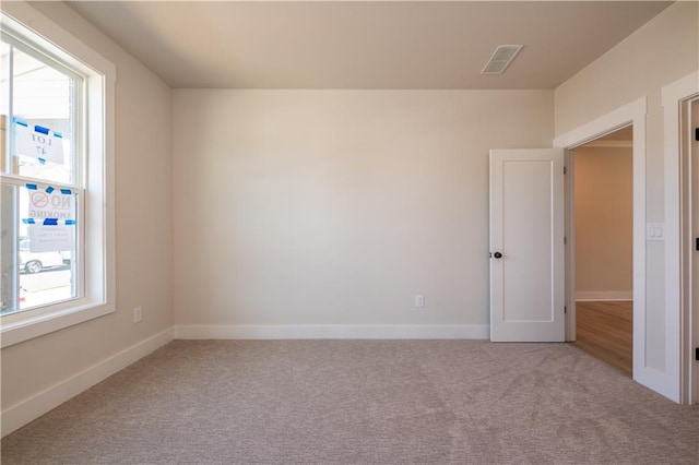 4202 Adler Cir, Buford, GA 30519 - unfurnished bedroom featuring a closet, baseboards, visible vents, and carpet floors