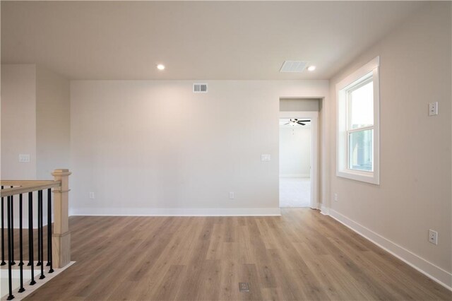 4202 Adler Cir, Buford, GA 30519 - doorway to outside with visible vents, baseboards, crown molding, light wood finished floors, and recessed lighting