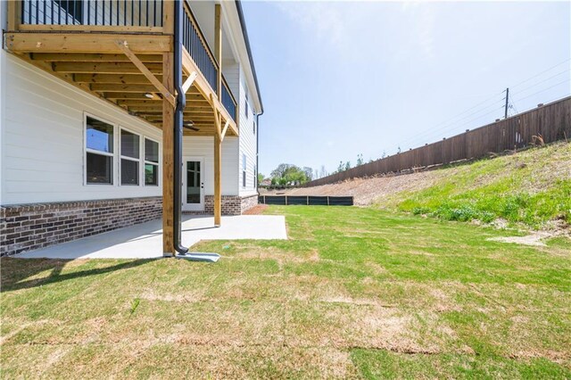 4202 Adler Cir, Buford, GA 30519 - view of patio / terrace with ceiling fan and fence