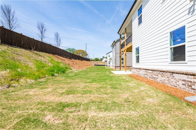 4202 Adler Cir, Buford, GA 30519 - rear view of property with a patio, a yard, brick siding, and a balcony