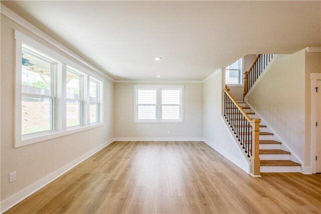 4202 Adler Cir, Buford, GA 30519 - hallway with baseboards, ornamental molding, recessed lighting, stairs, and light wood-style floors