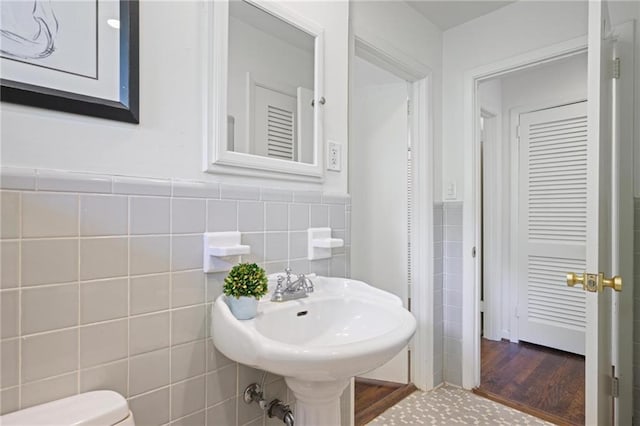 2800 Mornington Dr NW, Atlanta, GA 30327 - bathroom with tile walls, a wainscoted wall, and wood finished floors