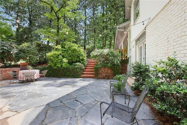 2800 Mornington Dr NW, Atlanta, GA 30327 - view of patio featuring outdoor dining area and stairway