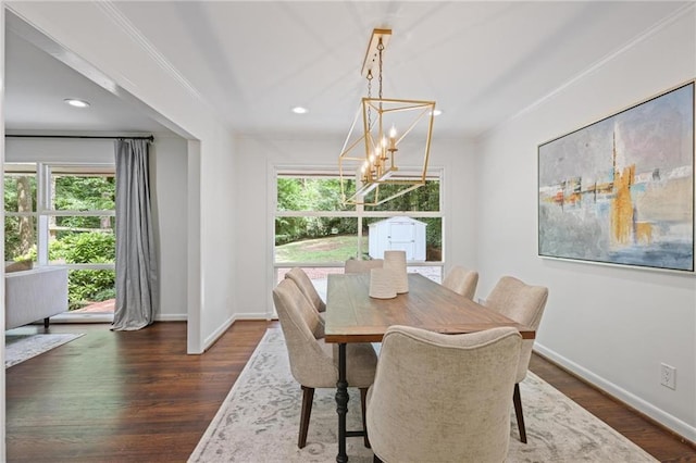 2800 Mornington Dr NW, Atlanta, GA 30327 - dining area with a chandelier, healthy amount of natural light, dark wood-type flooring, recessed lighting, and ornamental molding