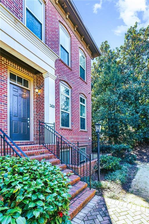 entrance to property with brick siding