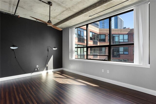 115 W Peachtree Pl NW Unit 602, Atlanta, GA 30313 - unfurnished room with wood finished floors, baseboards, and healthy amount of natural light