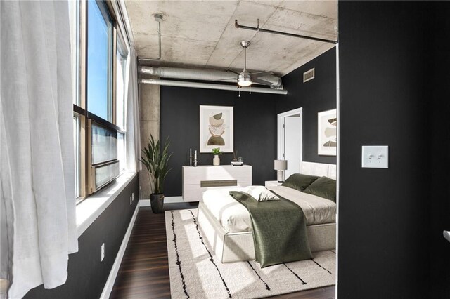 115 W Peachtree Pl NW Unit 602, Atlanta, GA 30313 - bedroom with dark wood finished floors and baseboards