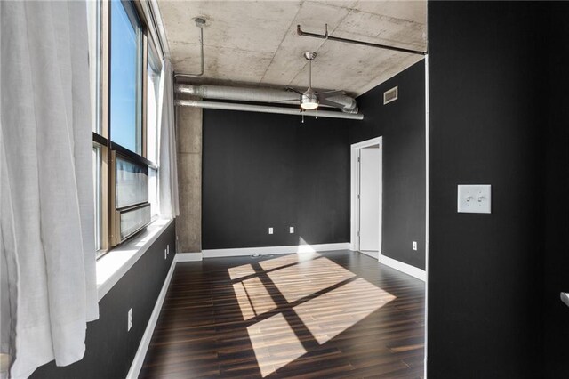 115 W Peachtree Pl NW Unit 602, Atlanta, GA 30313 - unfurnished room featuring dark wood finished floors, baseboards, and a ceiling fan