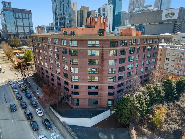 115 W Peachtree Pl NW Unit 602, Atlanta, GA 30313 - view of building exterior with a view of city