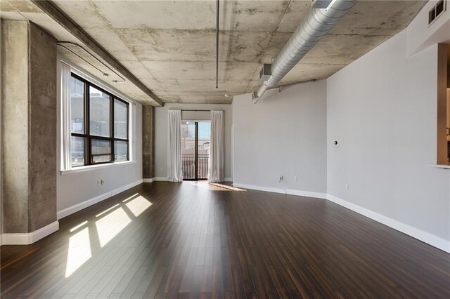 115 W Peachtree Pl NW Unit 602, Atlanta, GA 30313 - unfurnished room with wood finished floors and baseboards