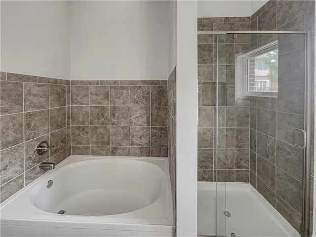 bathroom with independent shower and bath