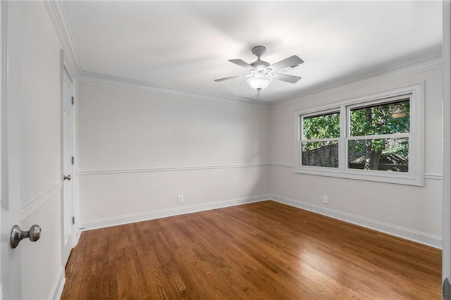 unfurnished room featuring hardwood / wood-style flooring, crown molding, and ceiling fan