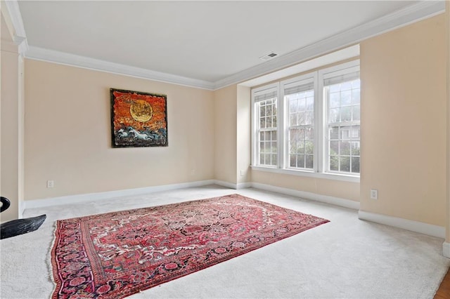 sitting room featuring light carpet and ornamental molding