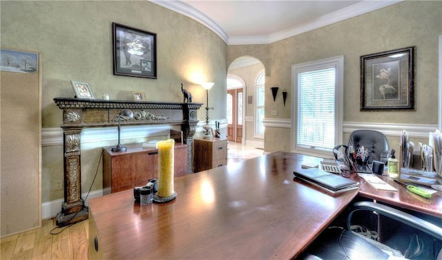 office space featuring crown molding and light wood-type flooring