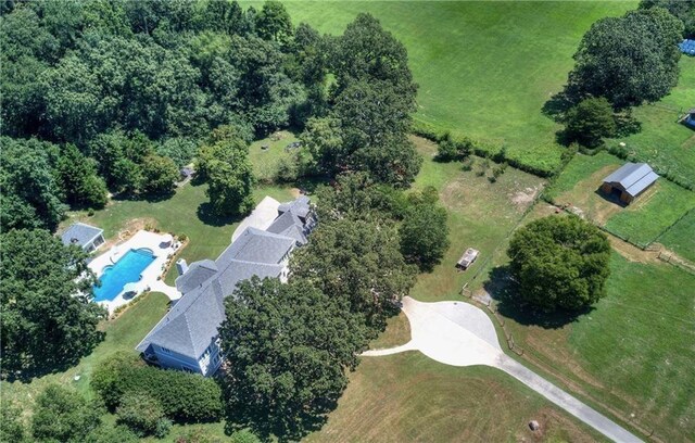 birds eye view of property featuring a rural view