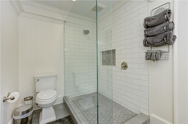 full bath featuring ornamental molding, tile patterned flooring, walk in shower, and toilet