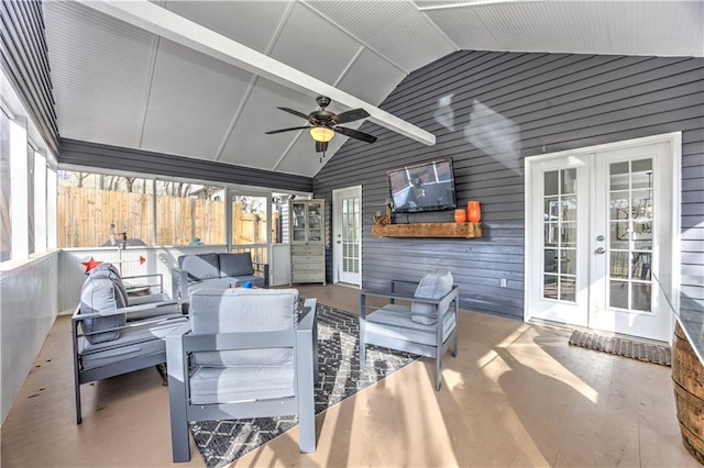 view of patio / terrace featuring french doors, outdoor lounge area, ceiling fan, and fence