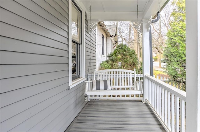 wooden deck featuring covered porch