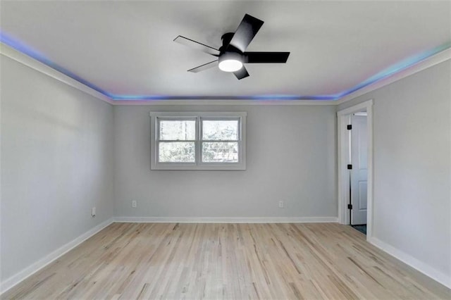 unfurnished room featuring ceiling fan and light hardwood / wood-style floors