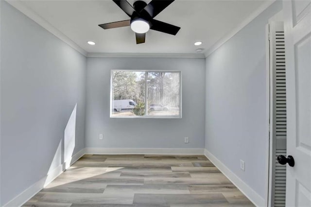 unfurnished bedroom with crown molding, ceiling fan, and light hardwood / wood-style flooring