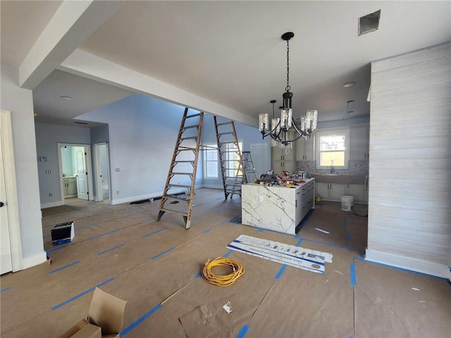 dining space featuring a chandelier