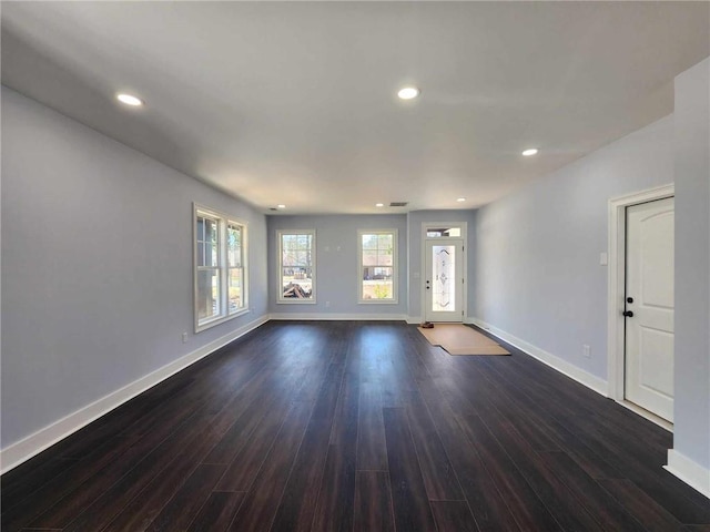 living room with a high ceiling