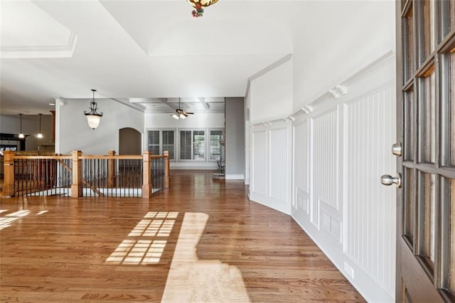 interior space with hardwood / wood-style floors and ceiling fan