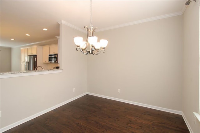 unfurnished dining area featuring ornamental molding, a chandelier, baseboards, dark wood finished floors, and recessed lighting