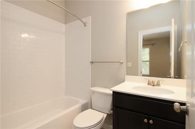 full bathroom featuring toilet, vanity, and  shower combination