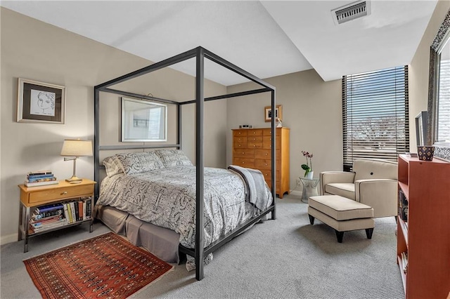 carpeted bedroom with baseboards