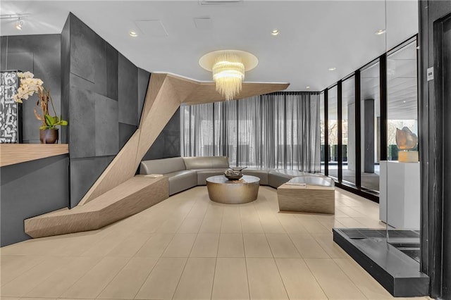 common area with floor to ceiling windows and recessed lighting