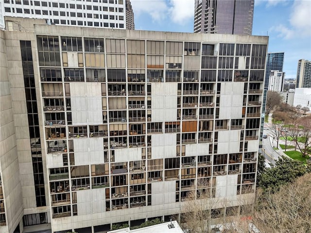 view of apartment building / complex with a view of city