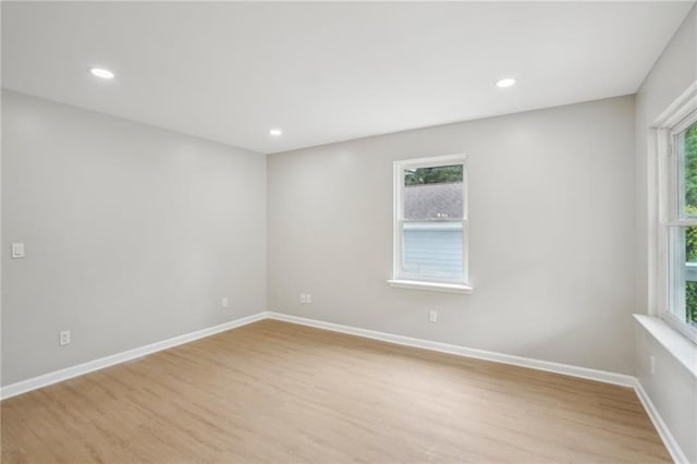 789 Third St, Stone Mountain, GA 30083 - spare room with plenty of natural light, light wood-type flooring, baseboards, and recessed lighting