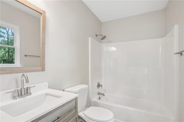789 Third St, Stone Mountain, GA 30083 - bathroom with toilet, vanity, and bathing tub / shower combination