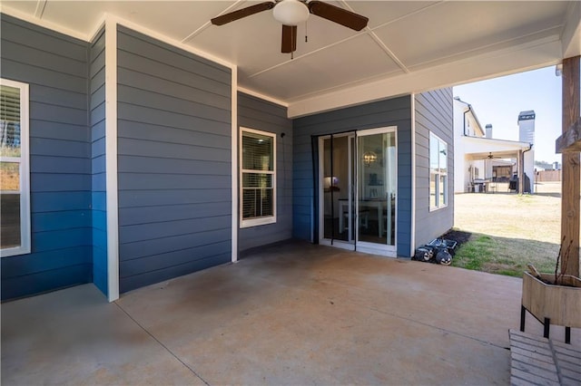 view of patio featuring a ceiling fan