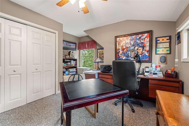 office area with ceiling fan, carpet, and vaulted ceiling