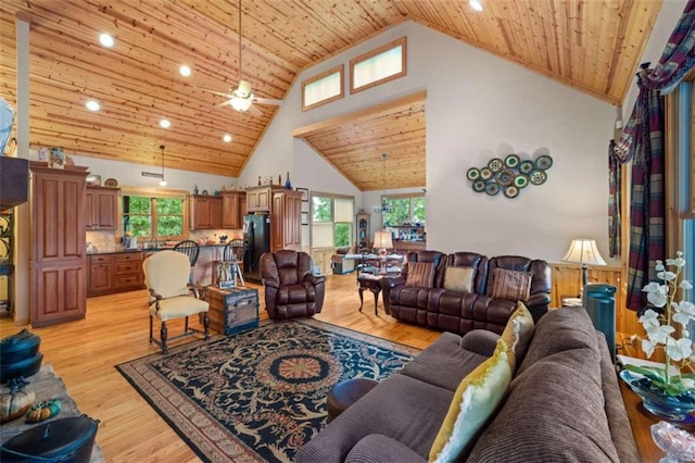 living room with recessed lighting, high vaulted ceiling, ceiling fan, light wood-type flooring, and wood ceiling