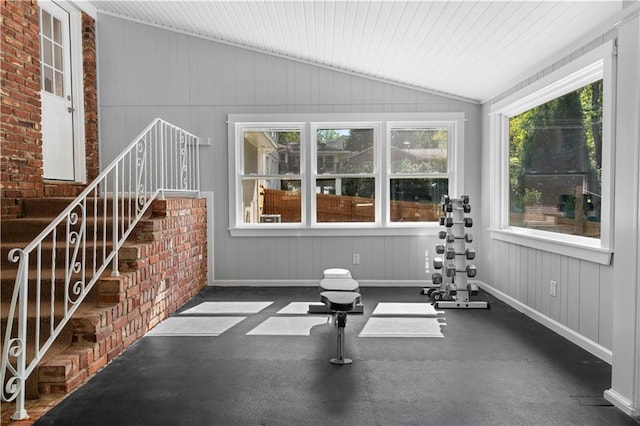 workout area featuring vaulted ceiling