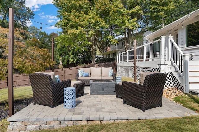 view of patio featuring an outdoor living space and a deck