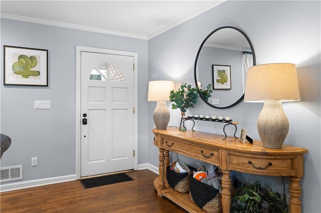 entryway with dark wood-type flooring and ornamental molding