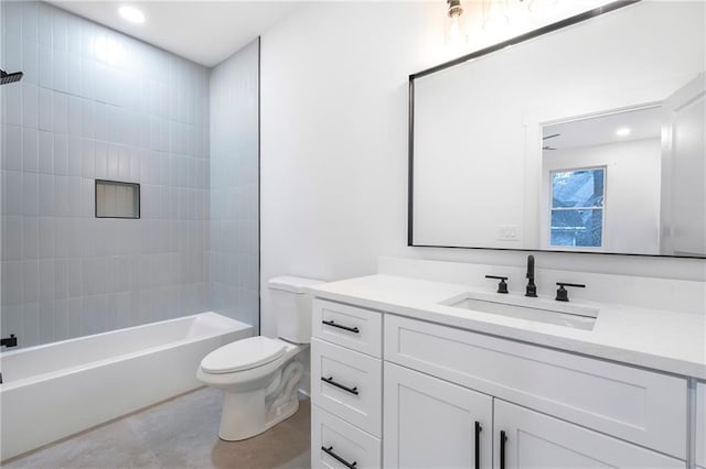 full bathroom with  shower combination, vanity, and toilet