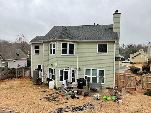 rear view of property with a patio