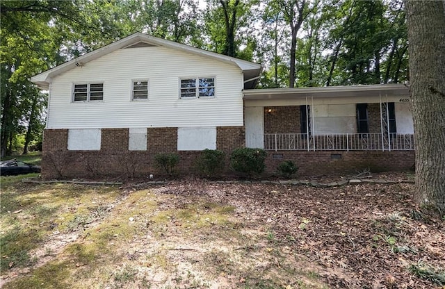 tri-level home featuring a porch