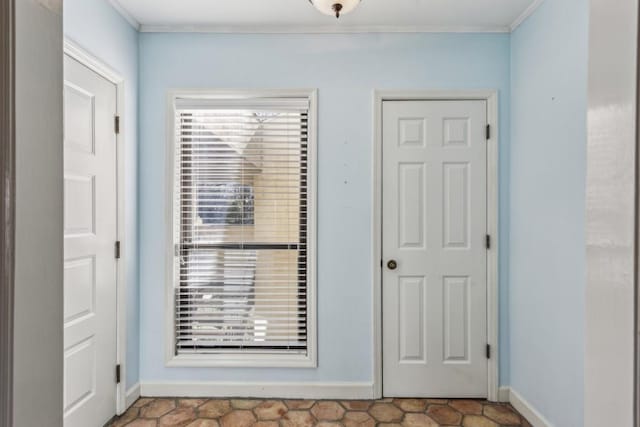 entryway with crown molding