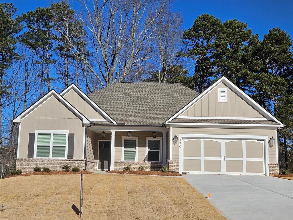 craftsman-style home featuring a garage