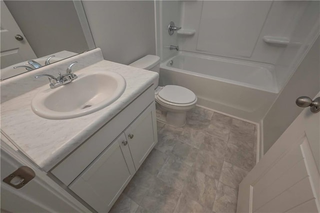 full bathroom featuring shower / washtub combination, vanity, and toilet