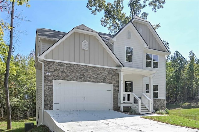 craftsman-style house with a front yard and a garage