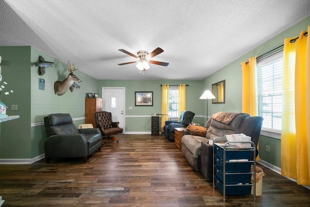 225 Hardin Rd SW, Plainville, GA 30733 - living room featuring wood finished floors, a ceiling fan, a textured ceiling, and baseboards