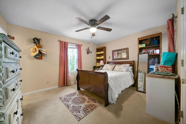 225 Hardin Rd SW, Plainville, GA 30733 - bedroom with light colored carpet, a textured ceiling, ceiling fan, and baseboards