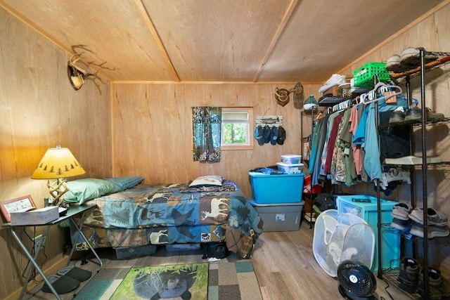 225 Hardin Rd SW, Plainville, GA 30733 - bedroom featuring wood finished floors, wood walls, and wooden ceiling